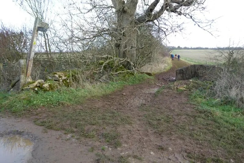 Cotswold Way footpath approaching the Neolithic long barrow at Belas Knap near Winchcombe