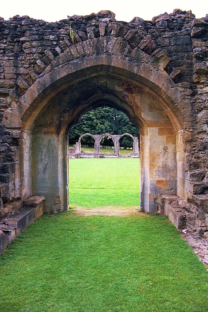 Stone archway at the ruins of Hailes Abbey near Winchcombe Stone archway at the ruins of Hailes Abbey near Winchcombe